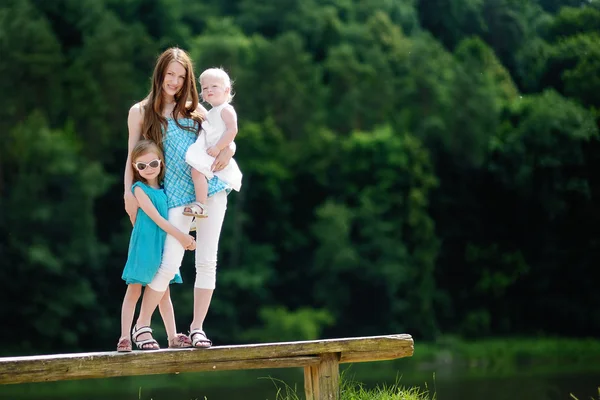 Young mother and her two daughters — Stock Photo, Image