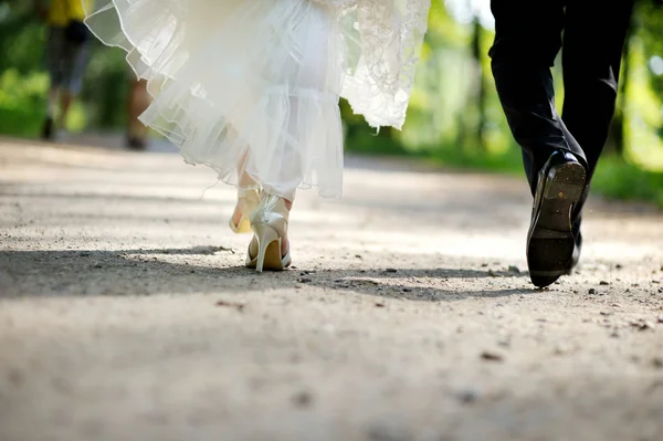 Bride and groom legs — Stock Photo, Image