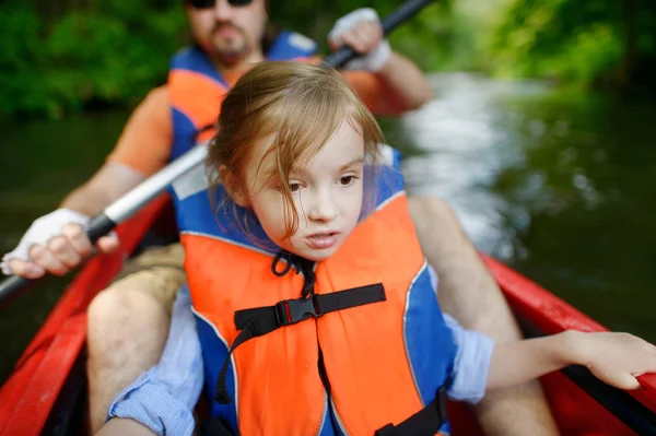 Little girl and her father on a kayak — Stock Photo, Image