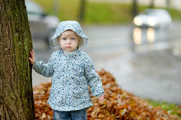 Adorable toddler girl at rainy day — Stock Photo, Image