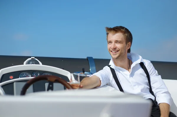 Happy groom on a yacht — Stock Photo, Image