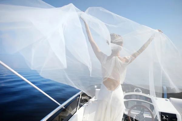 Happy bride on a yacht — Stock Photo, Image