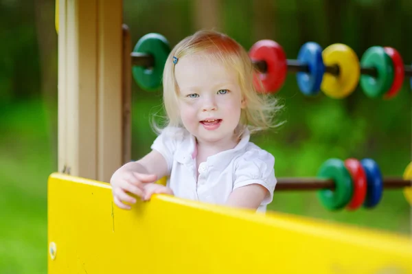 Chica en el parque infantil —  Fotos de Stock