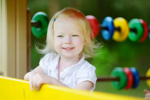 Menina no parque infantil — Fotografia de Stock