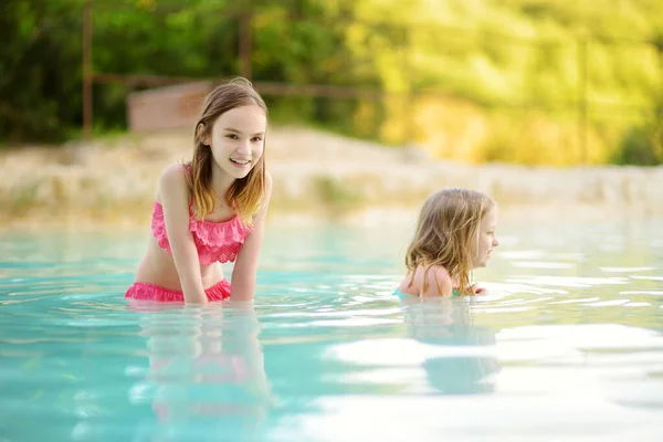 Two Young Sisters Bathing Natural Swimming Pool Bagno Vignoni Thermal — Stock Photo, Image