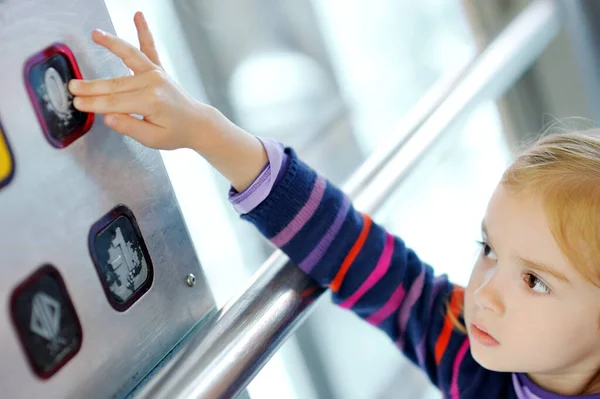 Cute Little Girl Pressing Elevator Button Her Finger Child Reaching — Stock Photo, Image
