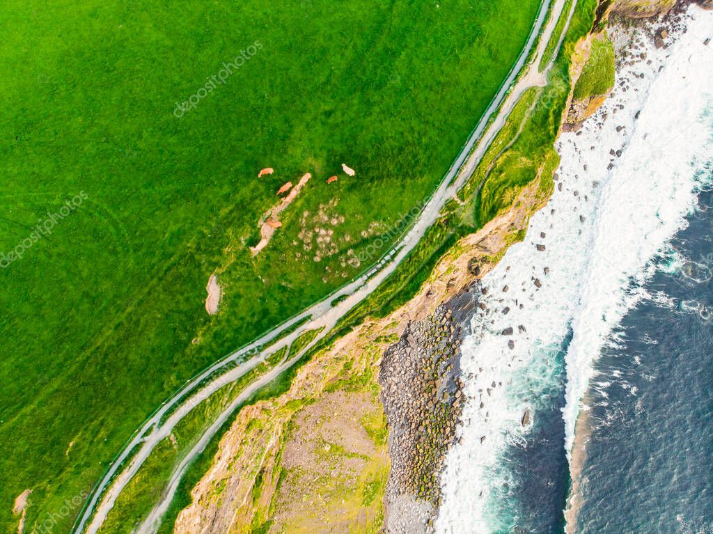 World famous Cliffs of Moher, one of the most popular tourist destinations in Ireland. Aerial view of widely known tourist attraction on Wild Atlantic Way in County Clare.