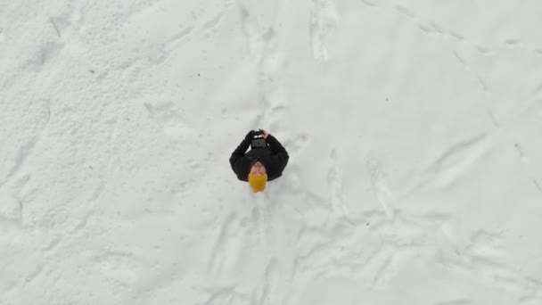 Aerial Top View Man Launching Drone Snow Covered Pine Forest — Stock videók