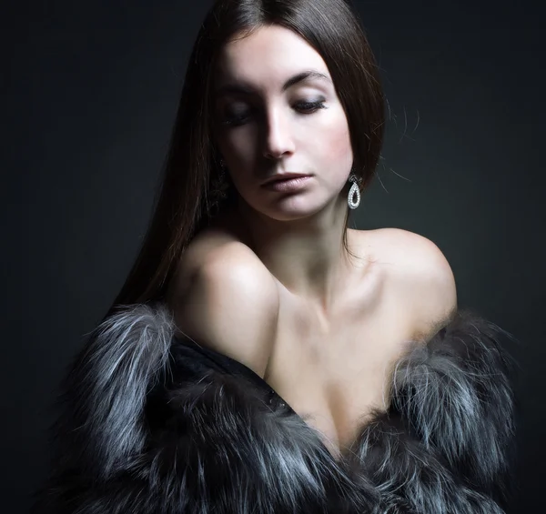 Woman in a fur coat. — Stock Photo, Image