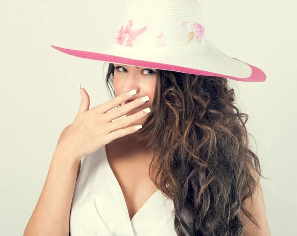 Woman in a white hat from the sun. — Stock Photo, Image