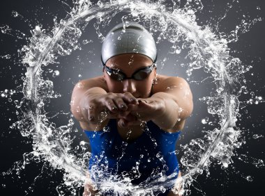 Swimmer jumps into the water. clipart