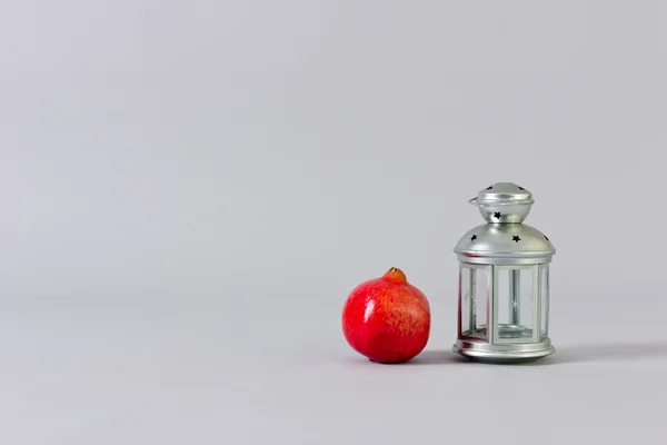 Lantern and red garnet. — Stock Photo, Image