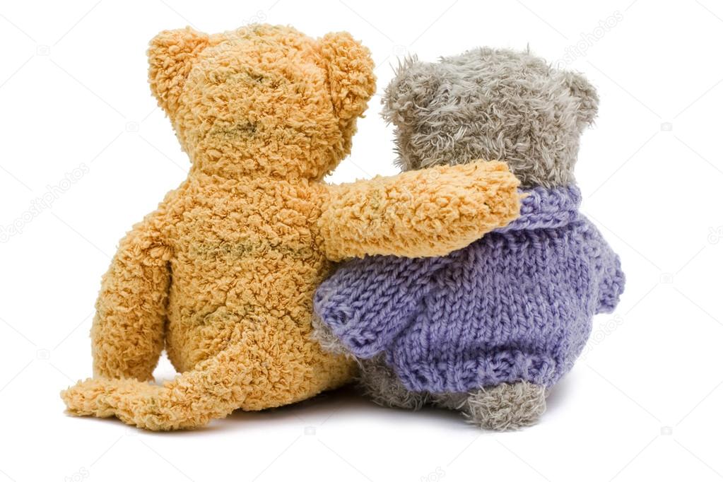 two teddies hugging