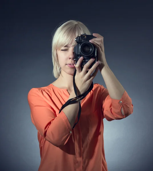 Woman with camera — Stock Photo, Image