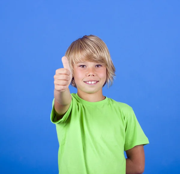 Happy boy showing thumbs up — Stock Photo, Image