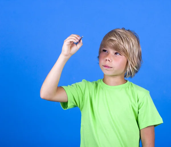 Little boy draws in space. — Stock Photo, Image