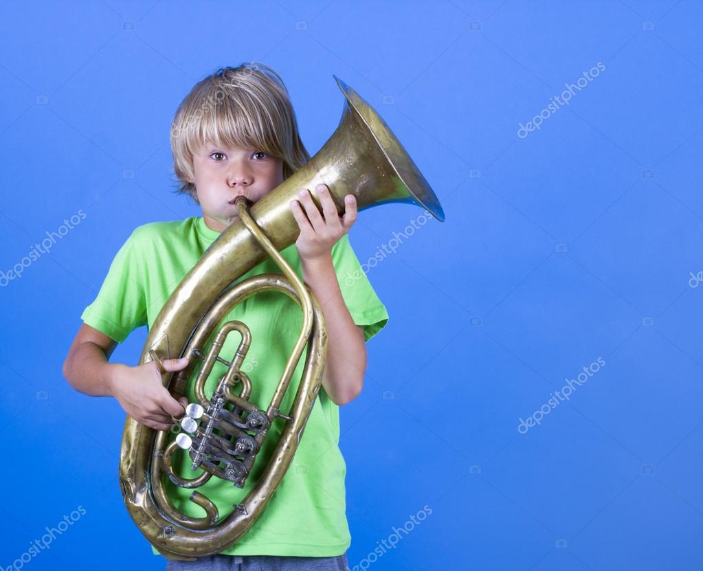 Boy Blowing Trumpet Stock Photo by ©papa42 31335675