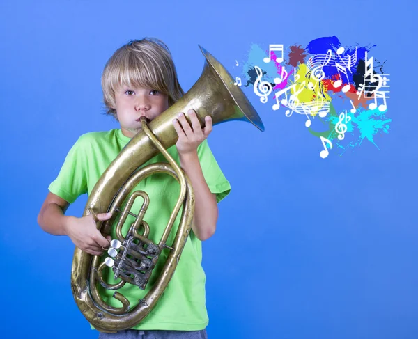 Boy playing on saxophone — Stock Photo, Image