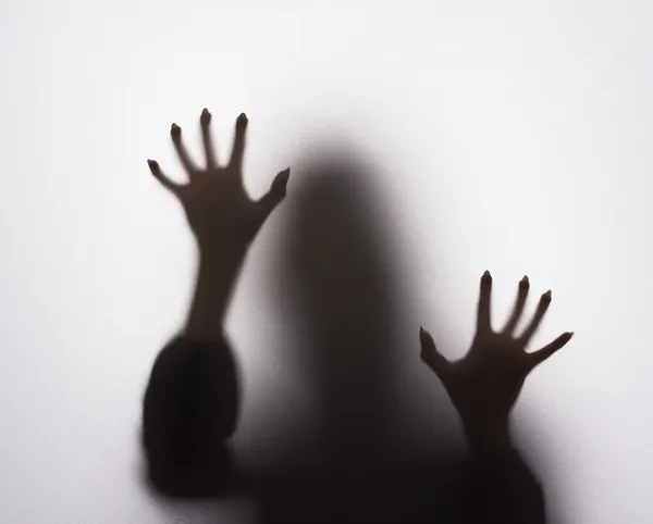 Scary female silhouette on the fabric. — Stock Photo, Image