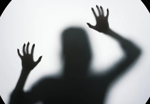 Scary female silhouette on the fabric. — Stock Photo, Image