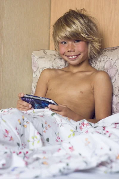 Boy playing PSP — Stock Photo, Image