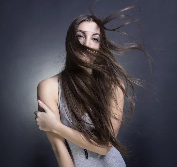 Woman with flying hair. — Stock Photo, Image