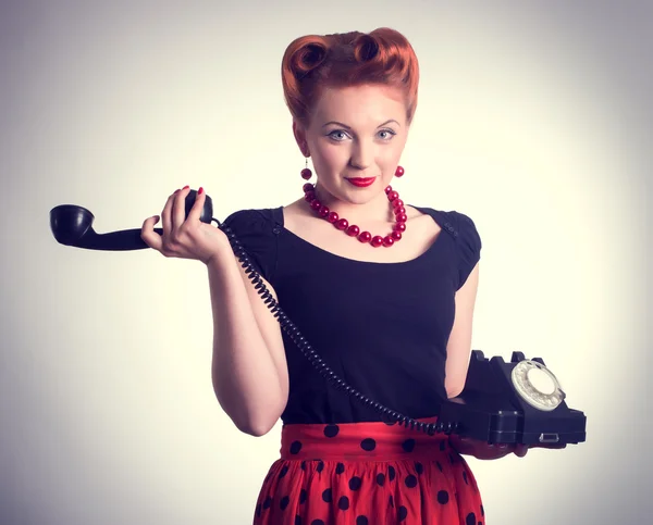 Woman talking on land line phone — Stock Photo, Image