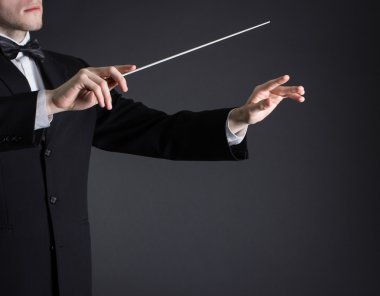 Man conducting an orchestra clipart