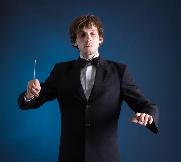 Man conducting an orchestra — Stock Photo, Image