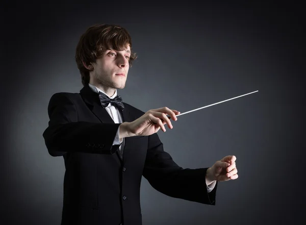 Man conducting an orchestra — Stock Photo, Image