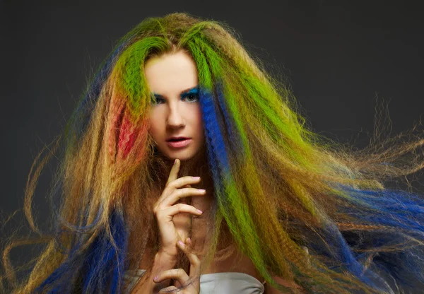 long-haired curly redhead woman