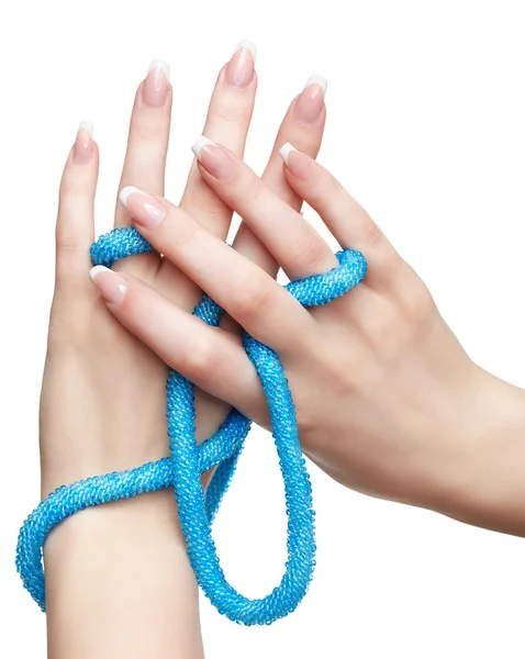 isolated hands with beads