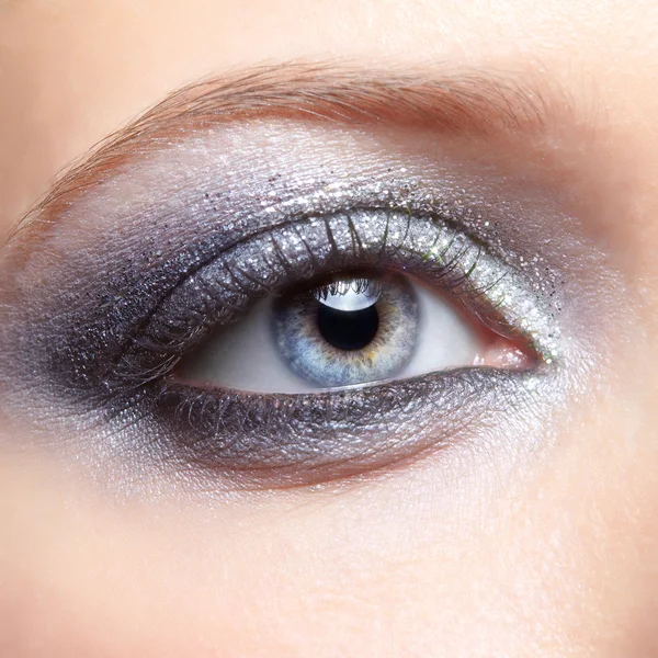 Shining woman eyes makeup