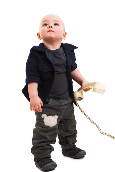 Хлопчик зі старим телефоном — стокове фото