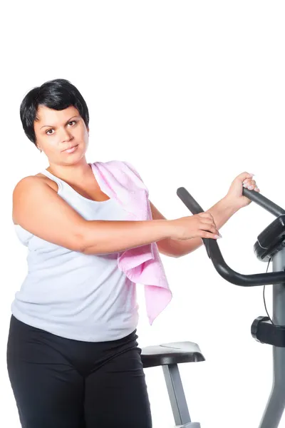 Entrenamiento de mujer gorda en la bicicleta — Foto de Stock