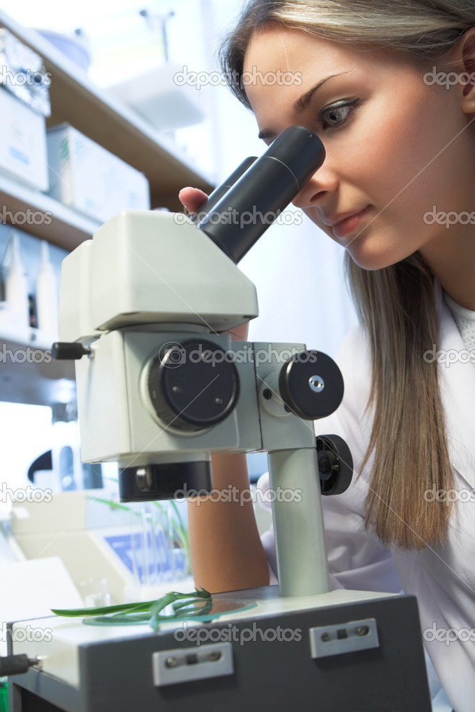 researcher with microscope