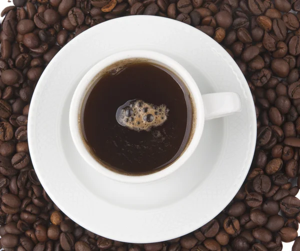 Kopp kaffe och bönor — Stockfoto