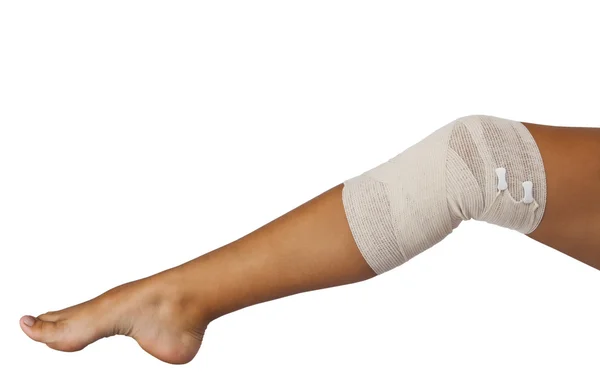 Elastische pleister op de knie gewrichten — Stockfoto