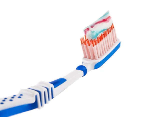 Zahnpasta mit Zahnbürste isoliert — Stockfoto