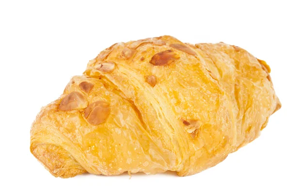 Croissant mit Nüssen isoliert — Stockfoto