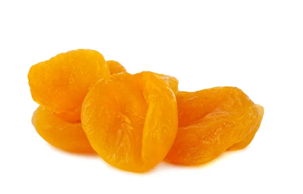 Изолированные сушеные абрикосы — стоковое фото