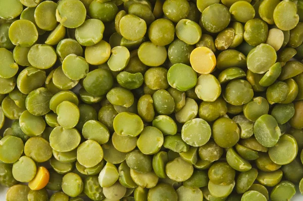 乾燥した緑エンドウ豆、テクスチャ背景 — ストック写真
