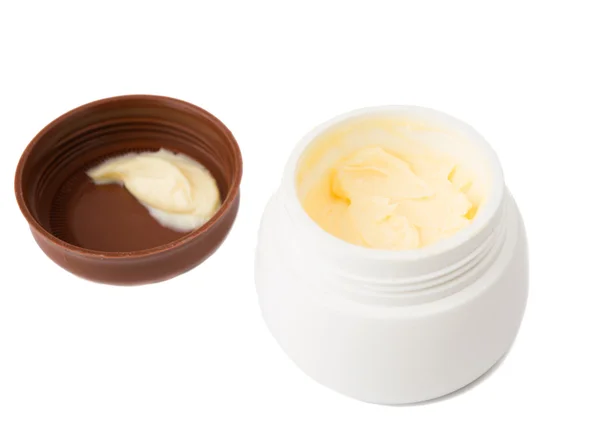 Cosmetic cream in container — Stock Photo, Image