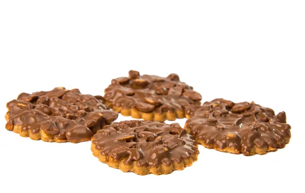 Ciasteczka z czekoladą i orzechami na białym tle — Zdjęcie stockowe