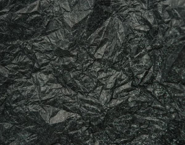 Verfrommeld zwart papier — Stockfoto