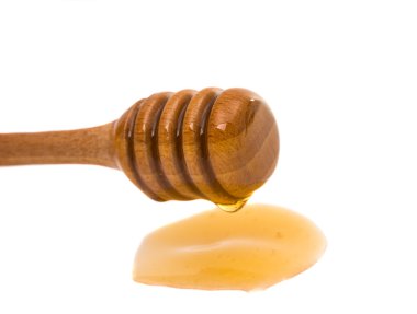 Tahta bir baldan damlayan bal