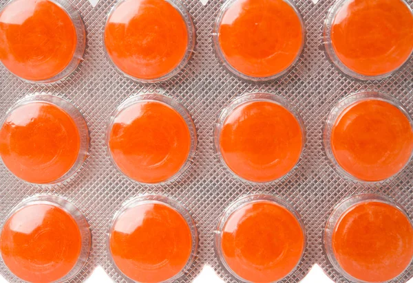 Orange piller blåsa makro — Stockfoto