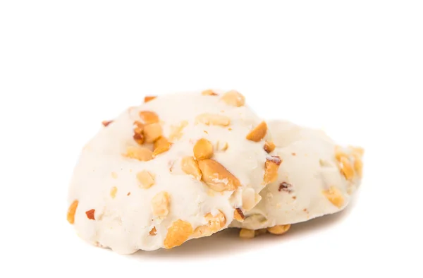 Cookies in white chocolate with nuts — Zdjęcie stockowe