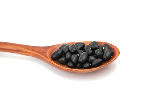 Pulses in a wooden spoon isolated — Stock Photo, Image