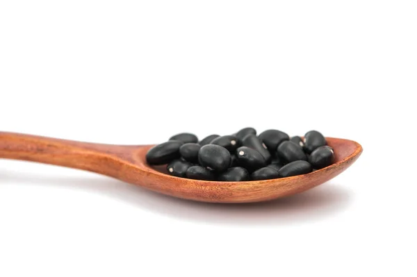 Pulses in a wooden spoon isolated — Stock Photo, Image